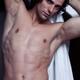 Young handsome man with long hair and sexy bare torso... (thumbnail)