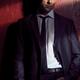 Expressive portrait of a man wearing a suit in dramatic light... (thumbnail)