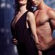 Sensual photo of couple standing in front of wet window... (thumbnail)