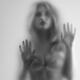 Woman blurred silhouette behind hazy glass... (thumbnail)