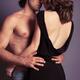 Portrait of sensual couple embracing about to kiss... (thumbnail)