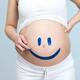 Pregnant woman belly with happy smiley... (thumbnail)