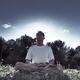Man meditating in the nature during sunrise... (thumbnail)