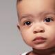 Cute black baby girl closeup portrait... (thumbnail)
