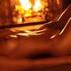 Nude woman lying in front of fireplace... (thumbnail)