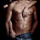 Woman behind sexy man with bare torso and jeans... (thumbnail)