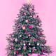 Decorated Christmas tree with presents on pink background... (thumbnail)
