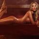 Beautiful nude woman with wet shiny sexy body lying naked in steam roo... (thumbnail)