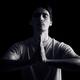 Person meditating with hands clasped... (thumbnail)