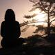 Woman silhouette over sunrise sky... (thumbnail)