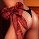 Sexy woman body with red Christmas bow... (thumbnail)
