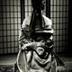 Asian Woman with Her Hands Tied Behind Her Back... (thumbnail)