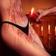 Melted red wax dripping on sexy woman body... (thumbnail)