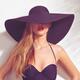 Beautiful woman in sunhat and swimsuit... (thumbnail)