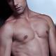 Closeup portrait of sexy young man with bare torso... (thumbnail)