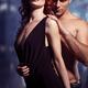 Sexy couple standing in front of wet window... (thumbnail)