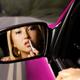 Woman Applying Lipstick in a Car... (thumbnail)