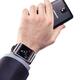 Hand with Samsung smartphone and Galaxy Gear watch... (thumbnail)