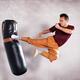 Martial artist practicing flying kick... (thumbnail)