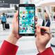Person using Samsung smartphone at airport... (thumbnail)