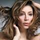 Beauty portrait of woman with flying light brown hair... (thumbnail)