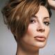 Beauty portrait of woman with her hair in updo... (thumbnail)