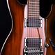 Artistic closeup of electric guitar pickups and tremolo... (thumbnail)