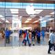 People shopping at Apple store in Canada... (thumbnail)