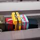 Colorful suitcases on airport baggage claim conveyor... (thumbnail)