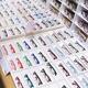 Eyeglasses on display in a store... (thumbnail)