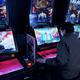 Person playing Lord of Vermilion arcade slot machines... (thumbnail)
