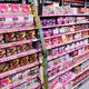 Blue ray disks on shelves of electronics store in Japan... (thumbnail)
