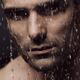 Dramatic portrait of man face with water pouring over it... (thumbnail)
