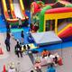 Children playground with inflatable rides... (thumbnail)