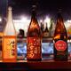 Japanese sake bottles in a bar... (thumbnail)
