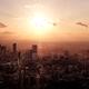 Tokyo city buildings cityscape lit with bright sunset... (thumbnail)