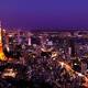 Tokyo Tower and brightly lit city at night... (thumbnail)