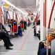 People riding subway train... (thumbnail)