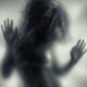 Woman blurred silhouette behind glass... (thumbnail)