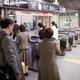 People entering Tokyo metro subway station... (thumbnail)