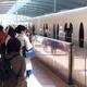 People boarding Disney Resort Line train in Tokyo... (thumbnail)