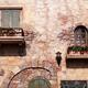 Windows with flowers of old rustic house... (thumbnail)