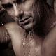 Dramatic portrait of young man under a shower... (thumbnail)