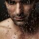 Thoughtful man face under pouring water... (thumbnail)