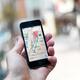 Person holding iPhone with GPS maps in hand... (thumbnail)