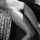 Nude woman body under a window... (thumbnail)