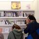 People listening to music at a store... (thumbnail)