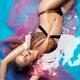Glamorous woman in bikini lying in water... (thumbnail)