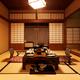 Japanese ryokan hotel room with dinner on table... (thumbnail)