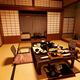 Japanese ryokan hotel room with served dinner... (thumbnail)